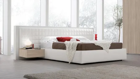 Letto con testiera Boiserie Maya in ecopelle trapuntata di Spagnol Salotti