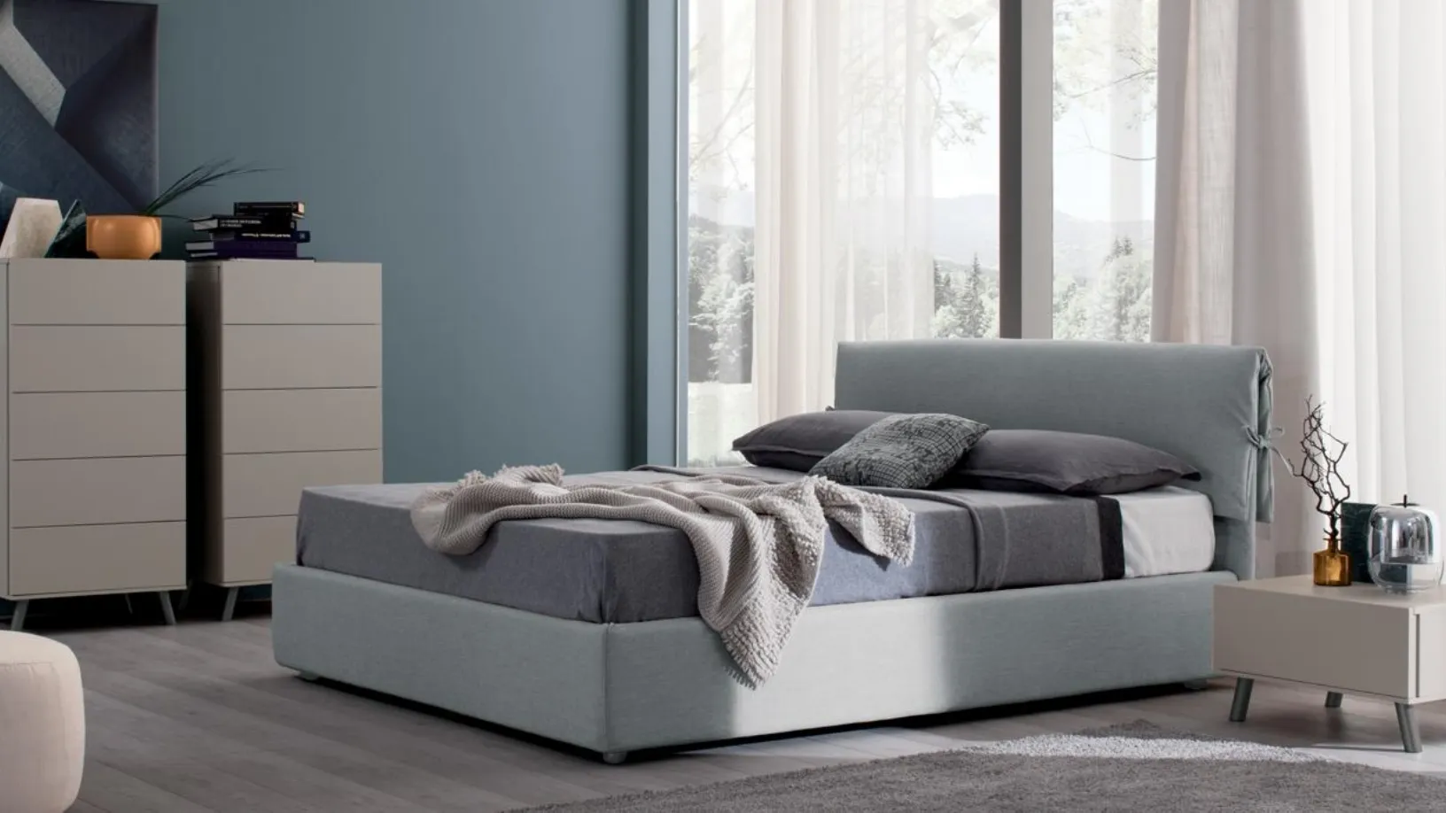 Letto in tessuto con testiera Luxor Box di Spagnol Salotti