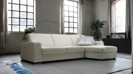 Divano Letto in tessuto con penisola contenitiva Charm di Spagnol Salotti